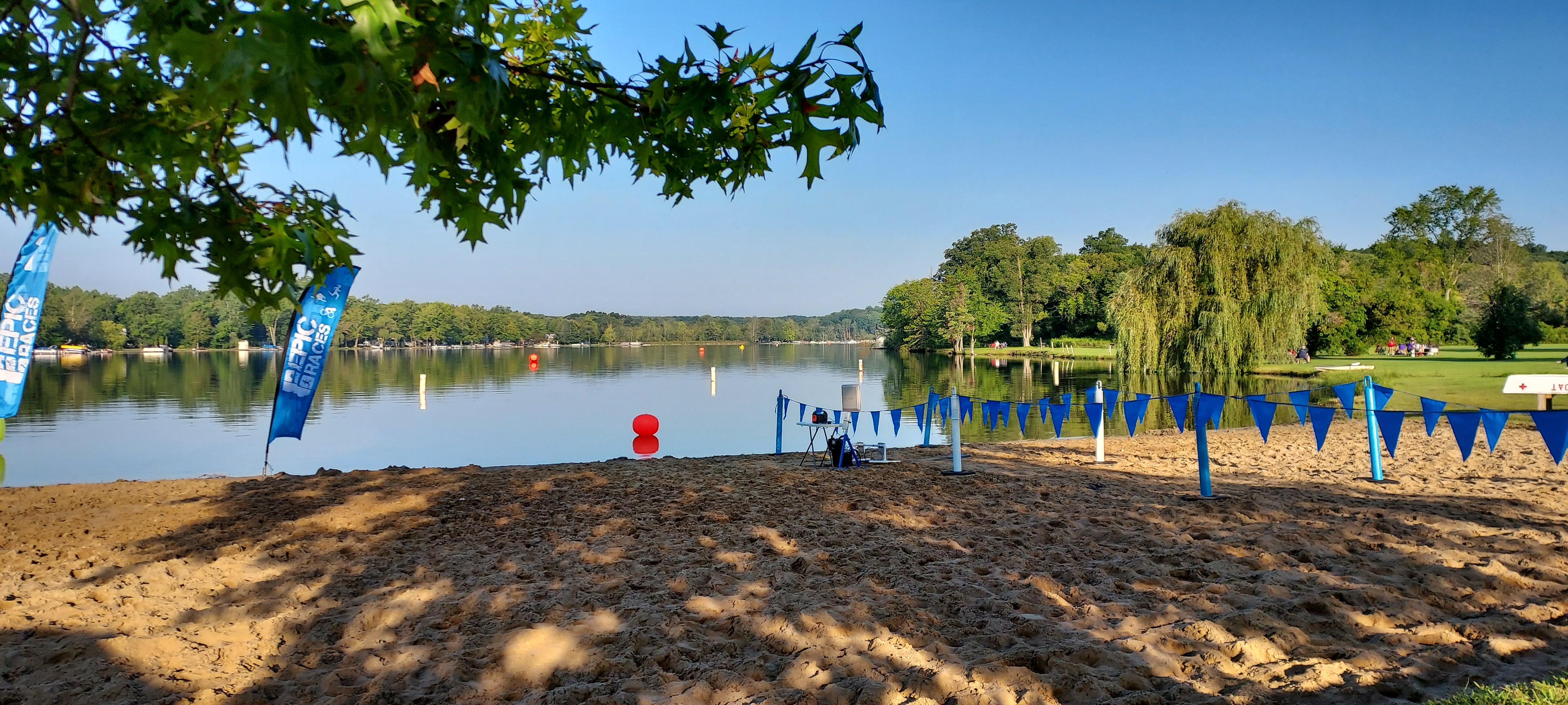 Half Moon Lake Beach with the roaps and flags setup for the swim